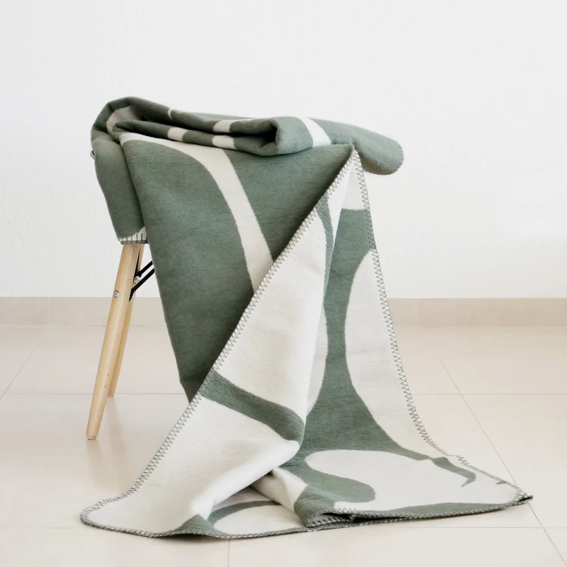RIEMA Kuscheldecke XL BJÖRK aus recycelter Baumwolle - Übergröße 150x230 - grün