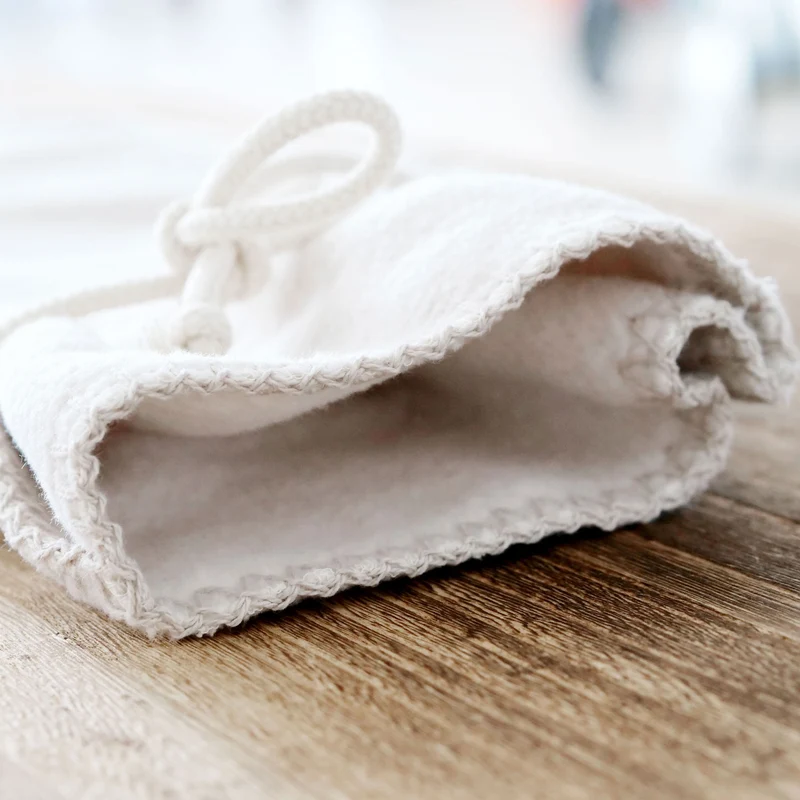 RIEMA Kuschelset aus Wolldecke EMMA und Wärmflaschenbezug, sand meliert