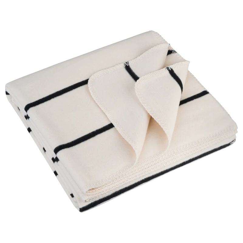RIEMA Kuscheldecke JULE aus 100% Bio-Baumwolle (kbA) schwarz-natur