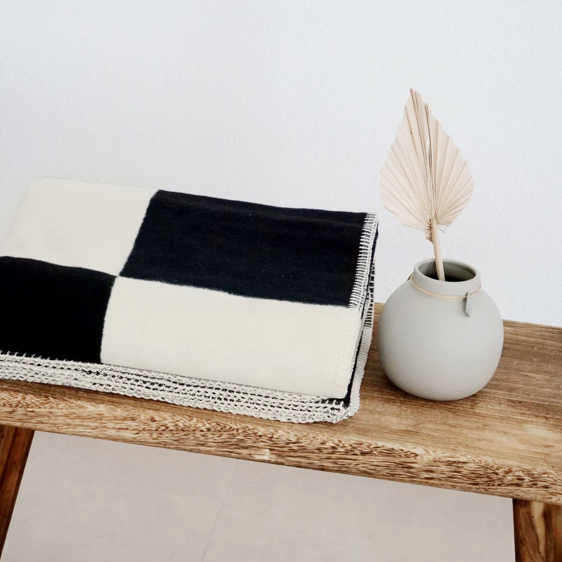 RIEMA Kuscheldecke CLARA aus 100% Bio-Baumwolle (kbA) schwarz natur