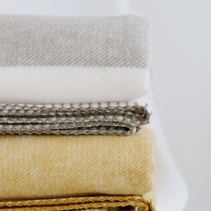 RIEMA Kuscheldecke STINE aus 100% Bio-Baumwolle (kbA) gelb weiß