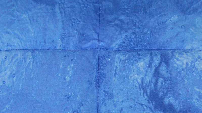 Körnerkissen mit realistischem Wassermotiv