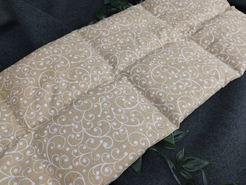 Körnerkissen Ranken in weiß auf beige