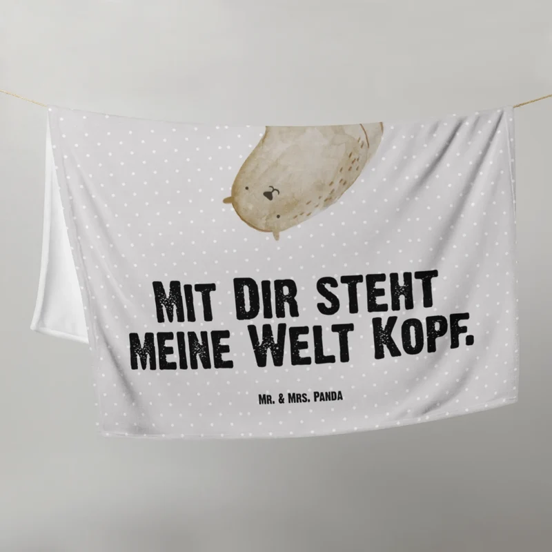 Babydecke Otter Kopfüber
