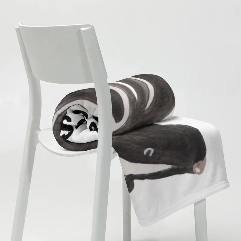 Babydecke Stinktier Sitzen