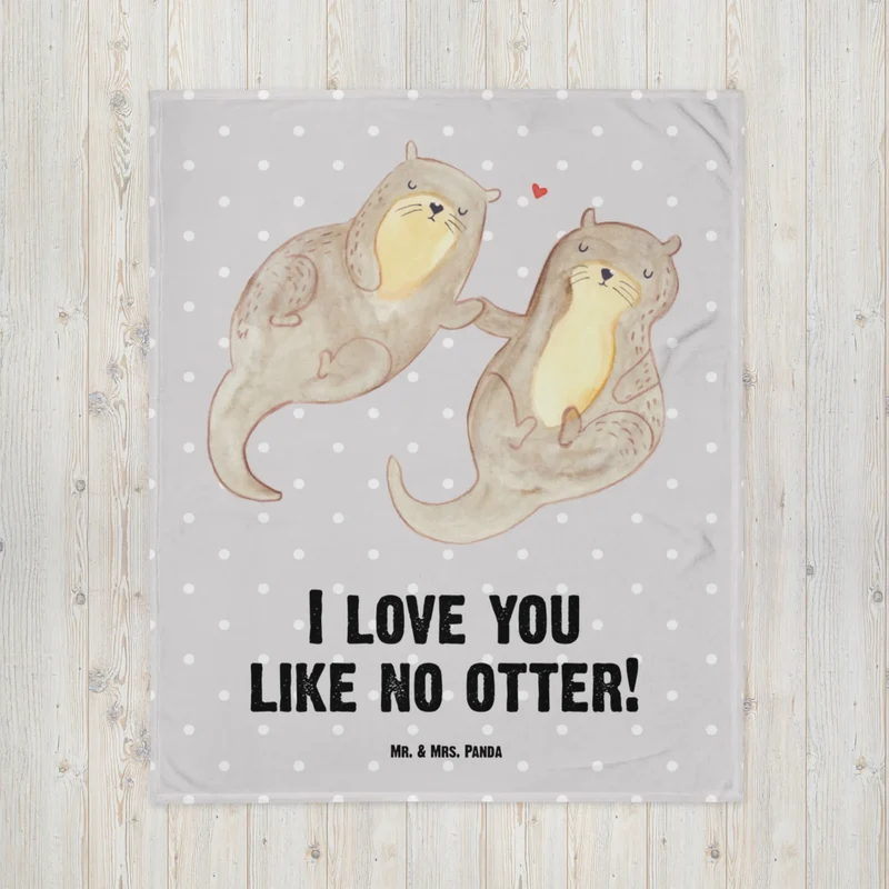 Babydecke Otter Hände halten