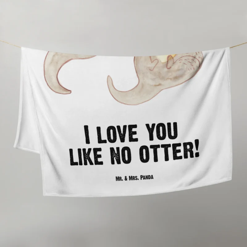 Babydecke Otter Hände halten